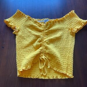 Yellow frilly off the shoulder crop top with elastic and tie. Rue 21 Brand